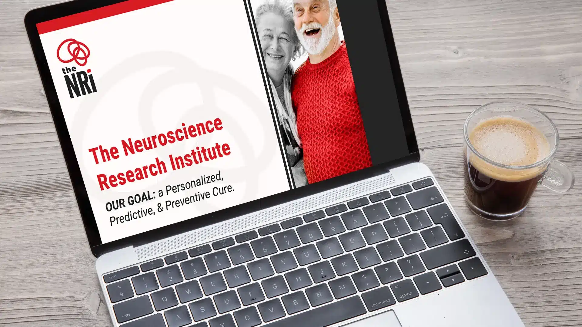 presentation slide show displayed on a laptop screen, sitting on a desk, beside a cup of coffee